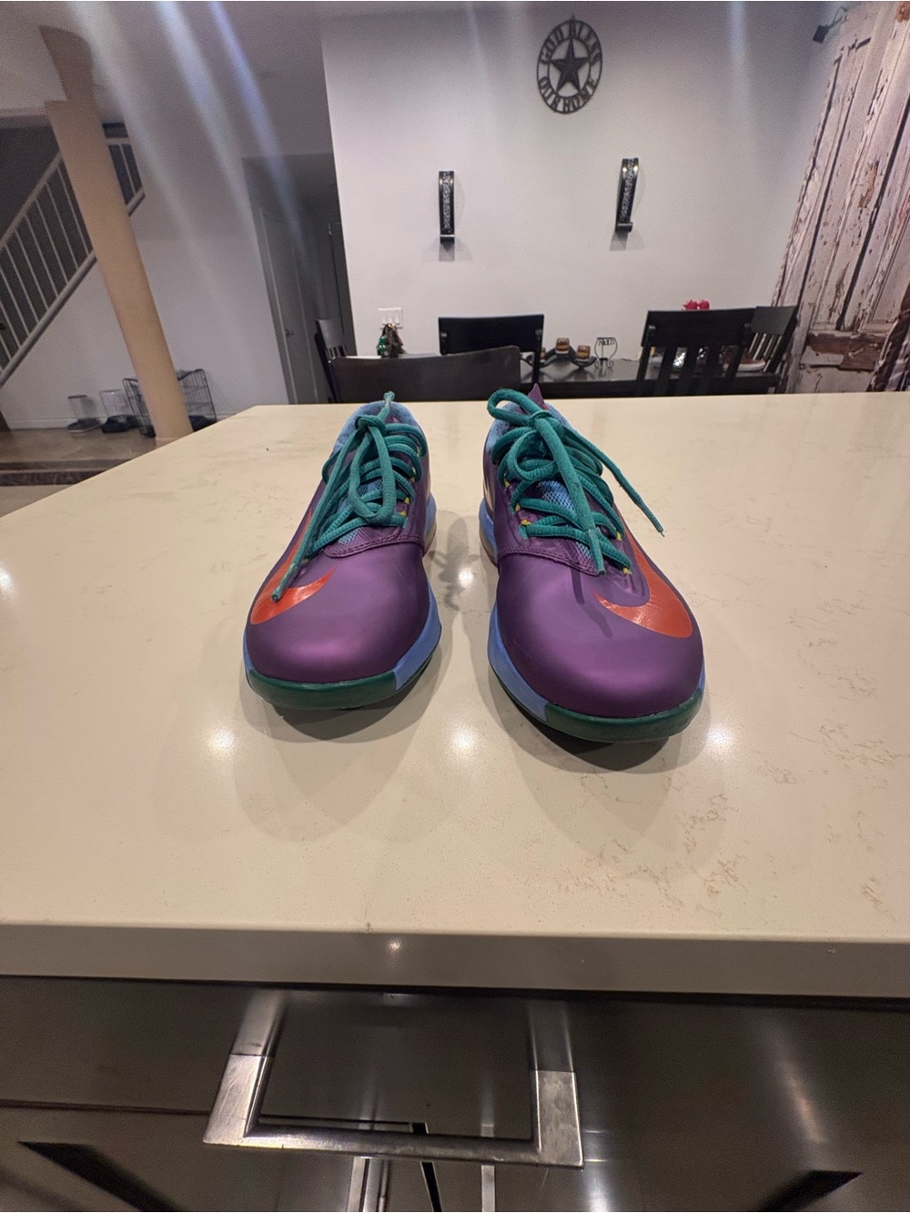 Nike Purple Athletic Sneakers with Teal Laces and Orange Swoosh